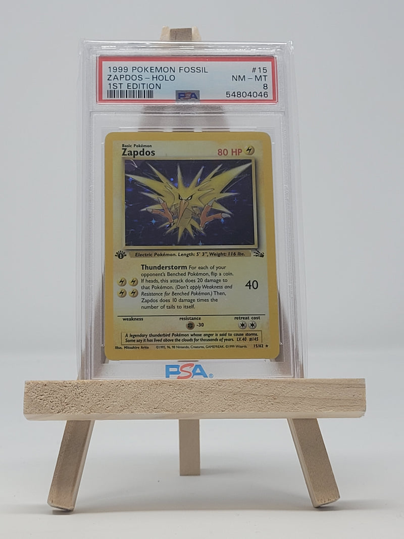 1st shops Edition Zapdos Holo Fossil PSA 8